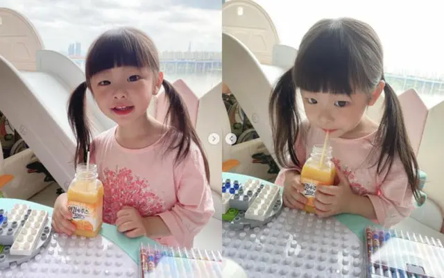 ムン・ヒジュン（H.O.T.）＆ソユル（元CRAYON POP）夫妻の娘ジェムジェムちゃん、すくすく成長中 「オレンジジュース大好き」（画像提供:wowkorea）