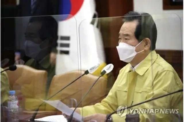 会議を主宰する丁首相＝23日、ソウル（聯合ニュース）