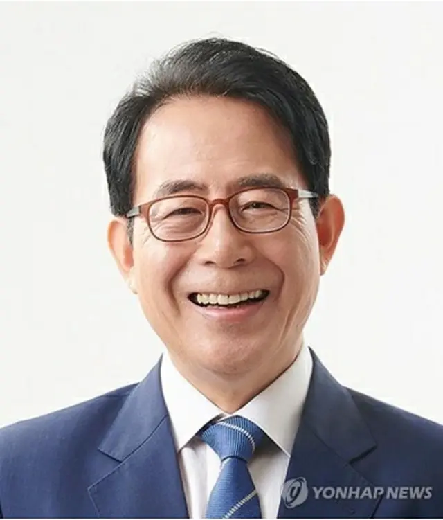 金星坤氏（中央選挙管理委員会提供）＝（聯合ニュース）≪転載・転用禁止≫