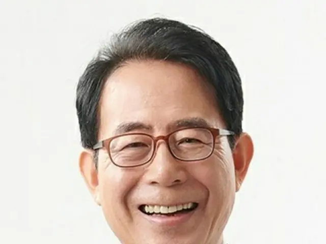 金星坤氏（中央選挙管理委員会提供）＝（聯合ニュース）≪転載・転用禁止≫