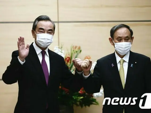 王毅外相訪日、菅首相と20分間会談「日中安定した関係が重要」＝韓国報道（画像提供:wowkorea）