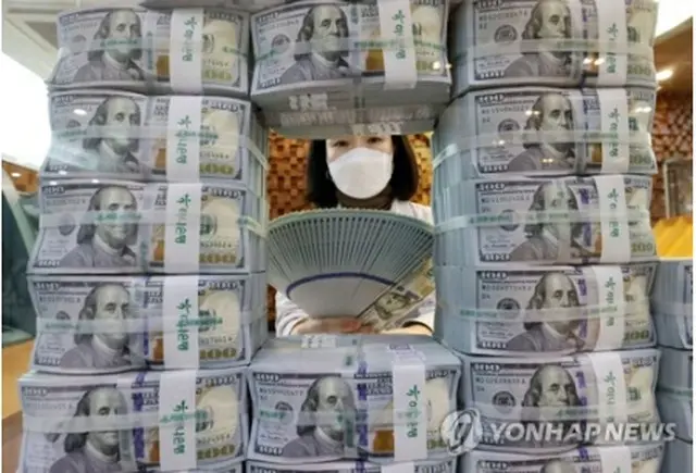 米ドル紙幣（資料写真）＝（聯合ニュース）