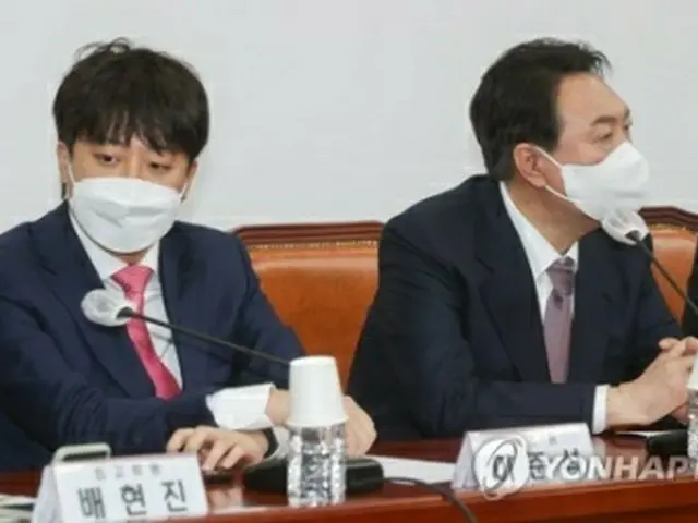 尹錫悦氏（右）と李俊錫氏（国会写真記者団）＝（聯合ニュース）