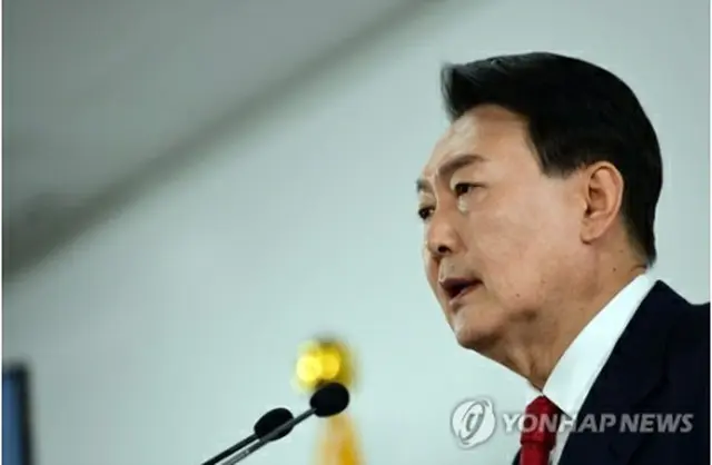 記者会見する尹錫悦氏（国会写真記者団）＝２０日、ソウル（聯合ニュース）