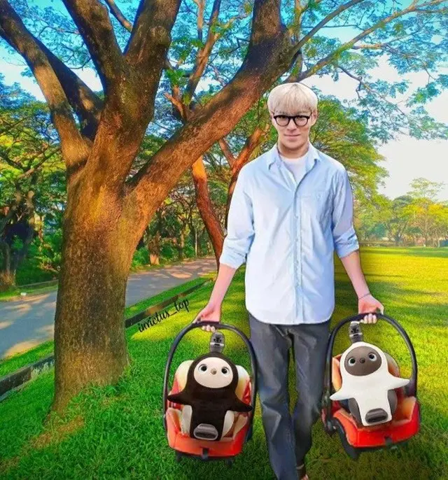 「BIGBANG」のメンバーT.O.Pがペット型のロボットを連れて散歩に行った（画像提供:wowkorea）