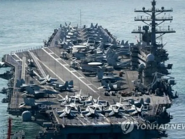 韓米合同演習に参加するため、９月２３日に韓国南部の釜山作戦基地に入港した米海軍の原子力空母「ロナルド・レーガン」＝（聯合ニュース）