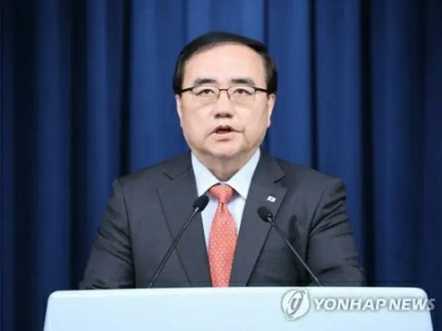 記者会見する金聖翰・国家安保室長＝１６日、ソウル（聯合ニュース）