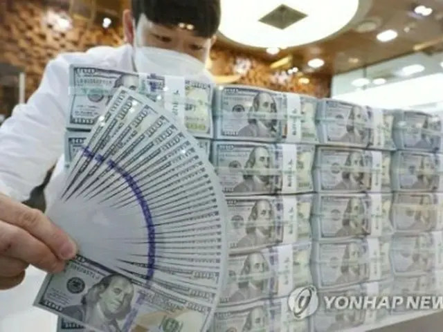 米ドル紙幣（資料写真）＝（聯合ニュース）