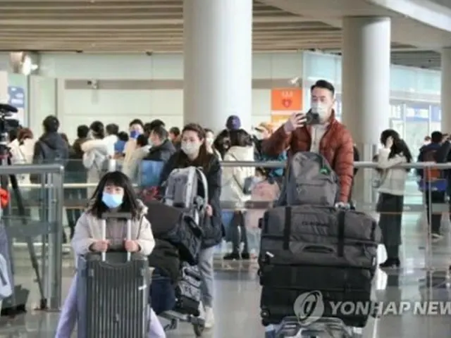 中国・北京の空港に到着した旅行客ら（資料写真）＝（聯合ニュース）