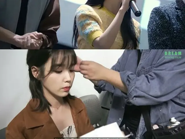 IU、手紙を読んだり写真を撮ったり…舞台あいさつの合間にファンサービス（画像提供:wowkorea）
