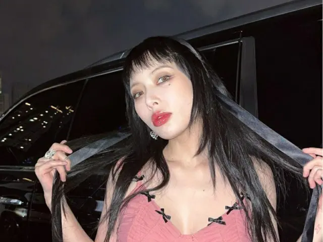 歌手ヒョナ、独歩的なグラマー…腕いっぱいのタトゥー（画像提供:wowkorea）
