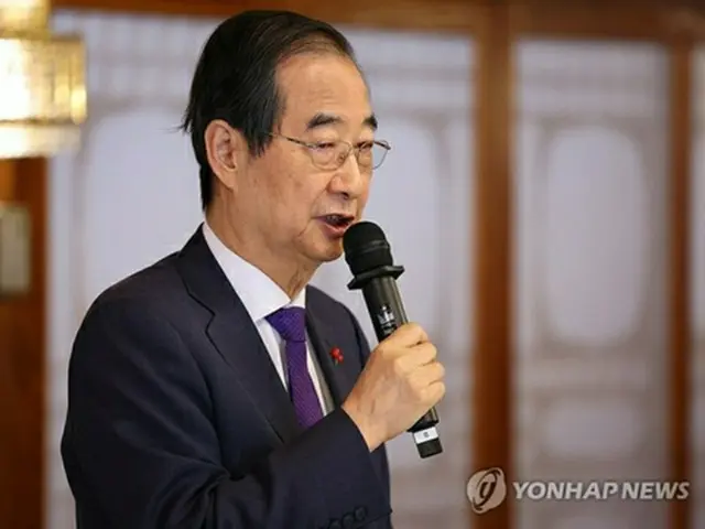 昼食会で発言する韓首相（大統領室通信写真記者団）＝２３日、ソウル（聯合ニュース）
