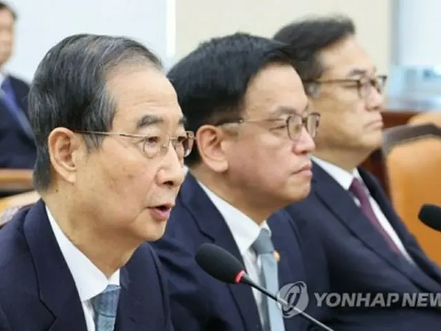 国会で開かれた聴聞会に出席した韓首相＝６日、ソウル（聯合ニュース）