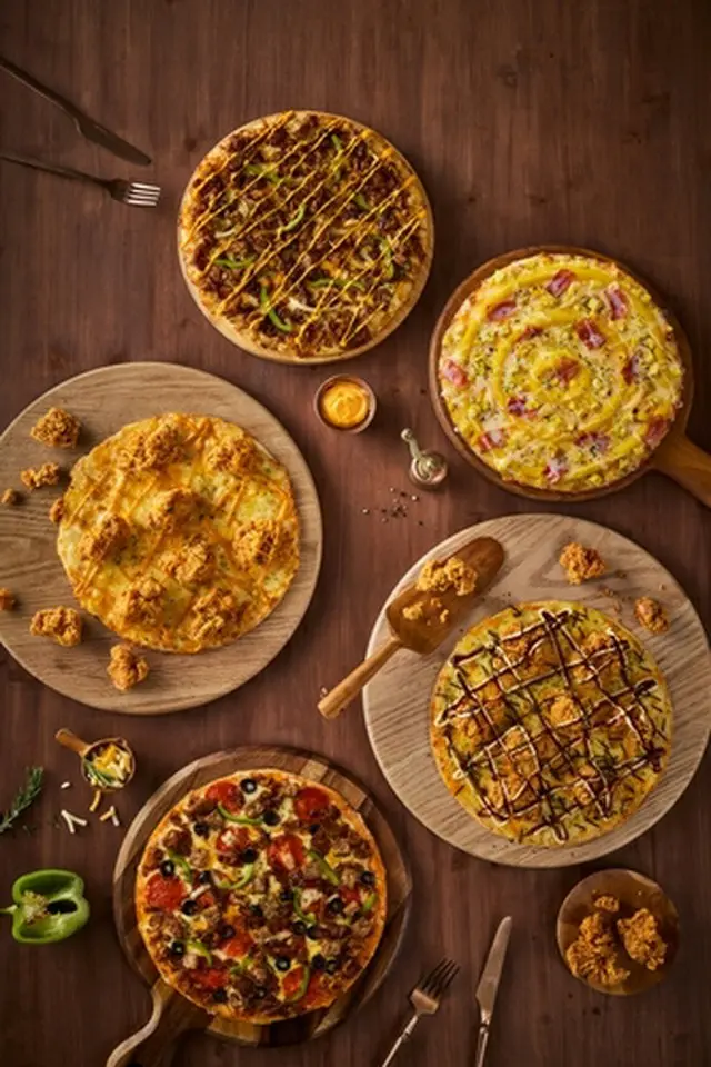 「ＭＯＭ'Ｓ　ＰＩＺＺＡ」のピザメニュー（マムズタッチアンドカンパニー提供）＝（聯合ニュース）≪転載・転用禁止≫
