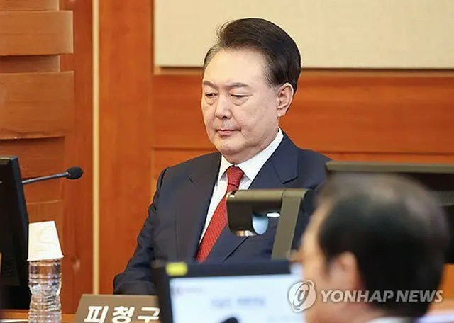 １３日、憲法裁判所の弾劾審判に出席した尹大統領＝（聯合ニュース）