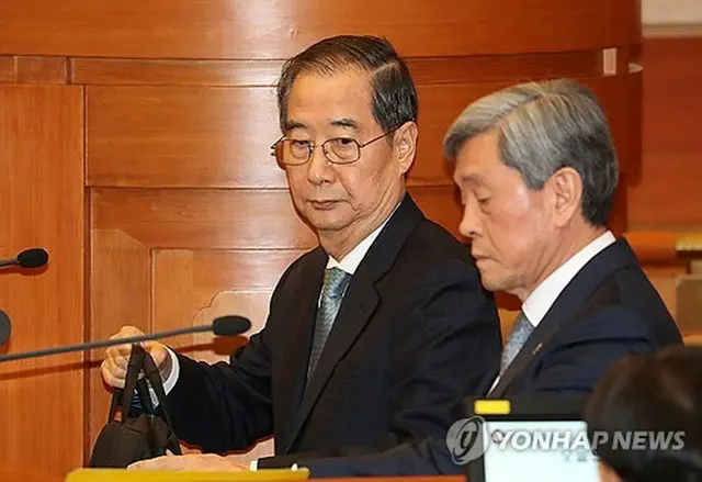 ２月１９日、憲法裁判所で開かれた弾劾審判の弁論に出席した韓悳洙首相＝（聯合ニュース）