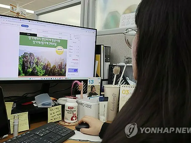 ソウル市内の旅行会社の社員＝（聯合ニュース）