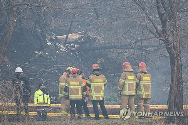 ヘリが墜落した現場＝２６日、義城（聯合ニュース）