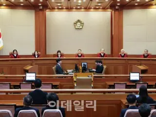 <W解説>韓国、ユン・ソギョル前大統領の罷免を宣告した憲法裁所長代行の庶民性が話題