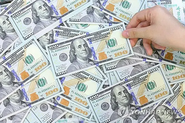 米ドル紙幣（資料写真）＝（聯合ニュース）