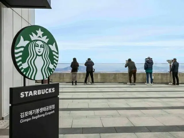 「北朝鮮が見えるスタバ」人気　開店７カ月で１２万人来店＝韓国