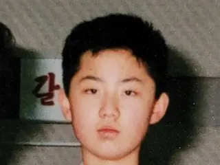 金正恩氏の13歳当時の写真、初公開「バスケ少年」＝韓国