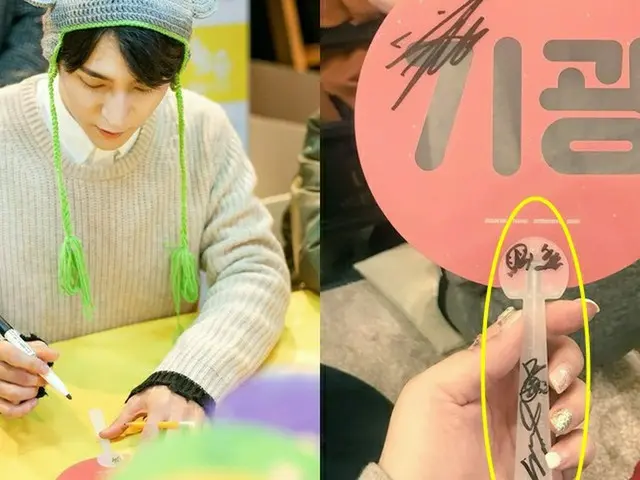 「Highlight」のサイン会、他のメンバーの応援うちわを大切にする人々。